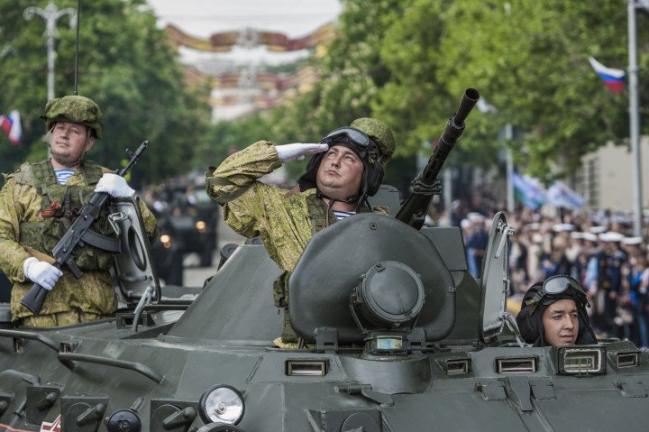Military parade in Crimea: Russian tank soldier salutes during on 9th May in occupied Sevastopol, Ukraine, 2018. (Photo by Celestino Arce/NurPhoto via Getty Images) Military parade in Crimea: Russian tank soldier salutes during on 9th May in occupied Sevastopol, Ukraine, 2018. (Photo by Celestino Arce/NurPhoto via Getty Images)
